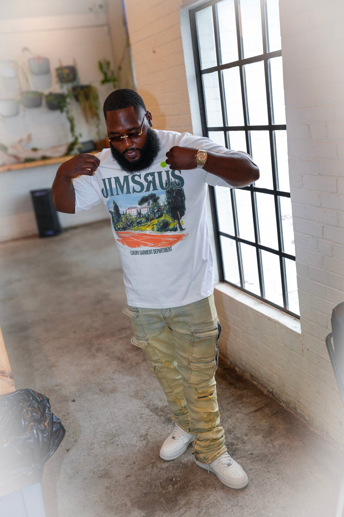JIMSRUS customer wearing graphic tee