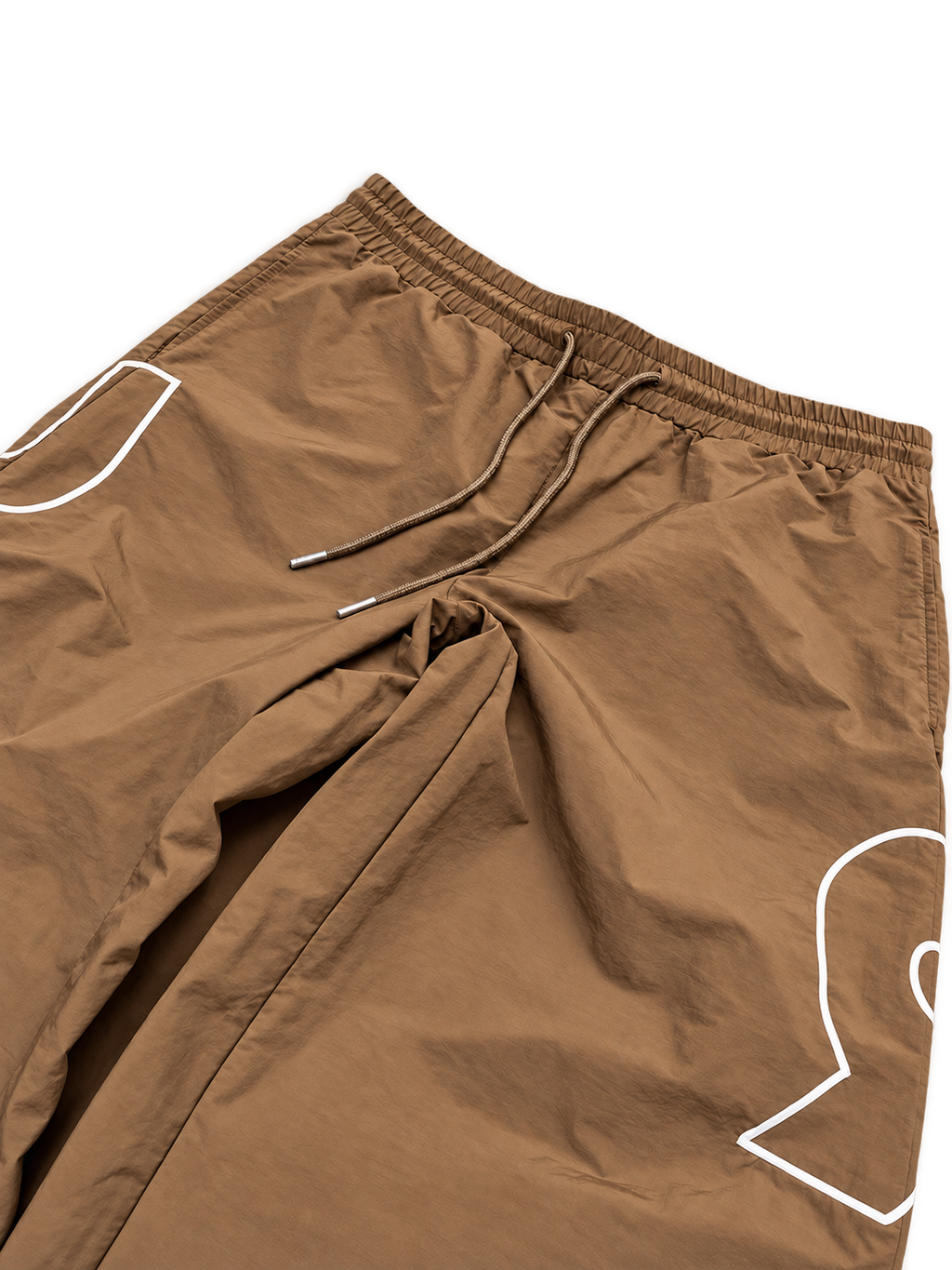 Tan Swish Pants closeup transparent background