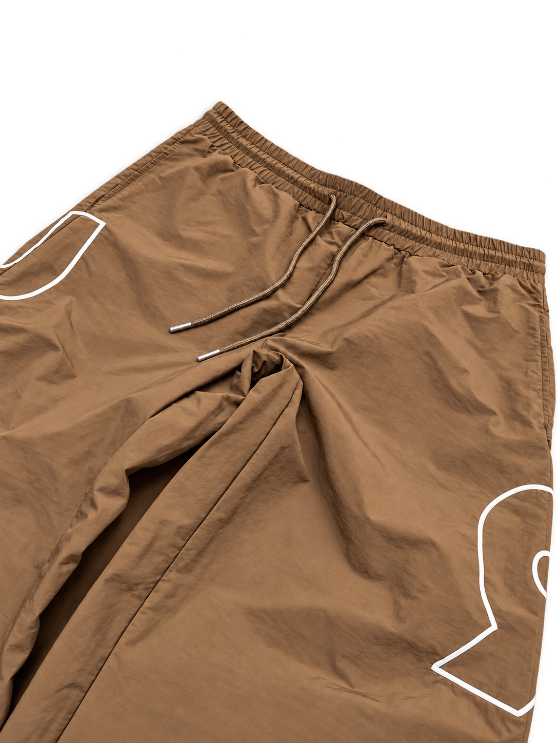 Tan Swish Pants closeup transparent background